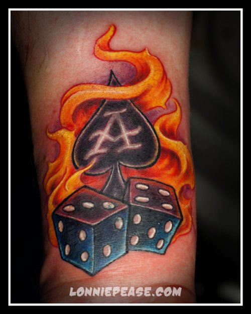 Flaming Ace and Dice Tattoo On Arm