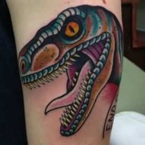 Color Dinosaur Tattoo On Left Sleeve