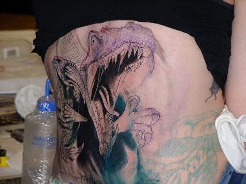 Dinosaur Tattoos On Girl Rib Side