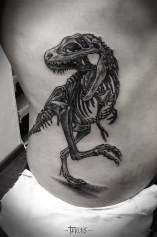 Beautiful Man Rib side Dinosaur Skeleton Tattoo