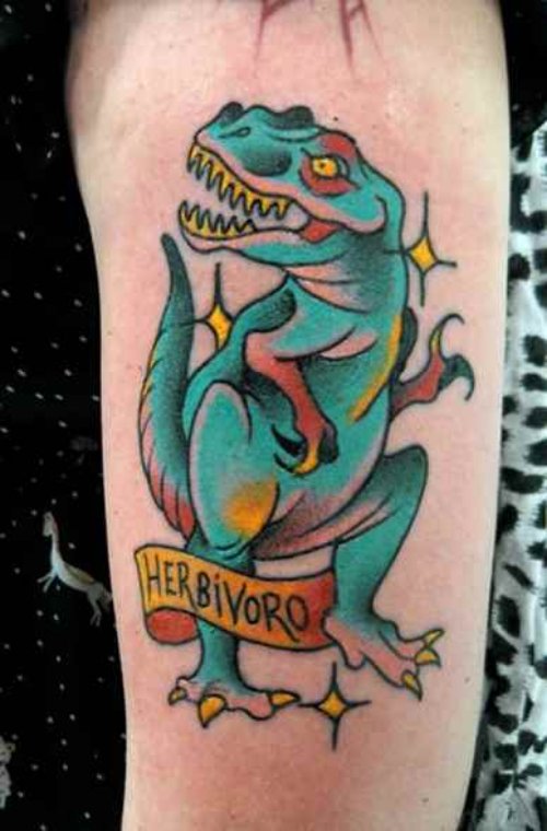 Blue Ink Dinosaur Tattoo On Left Sleeve