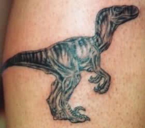 Grey Ink Dinosaur Tattoo