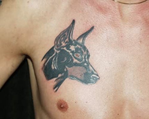 Black Dog Face Tattoo On Chest