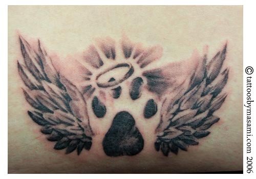 Winged Angel Paw Print Tattoo On Lowerback