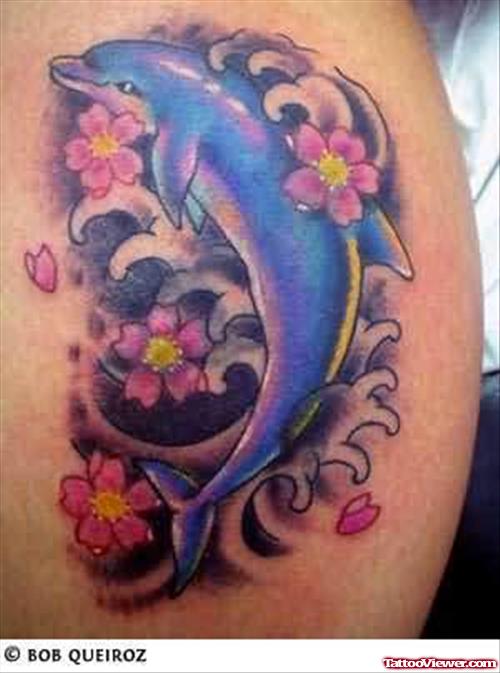 Dolphin In Flowers Tattoo