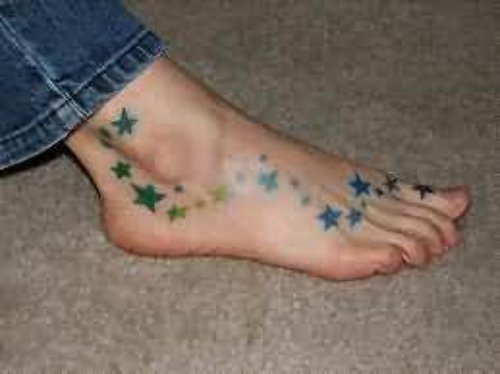 Dolphin Stars Tattoo On Foot