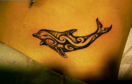 Tribal Dolphin Tattoo On Hip