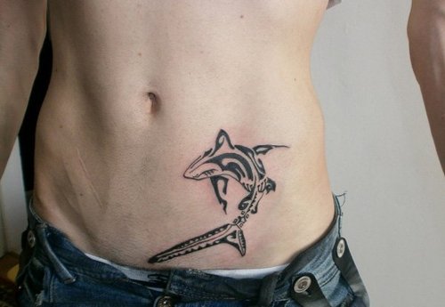Tribal Style Black Ink Dolphin Tattoo On waist