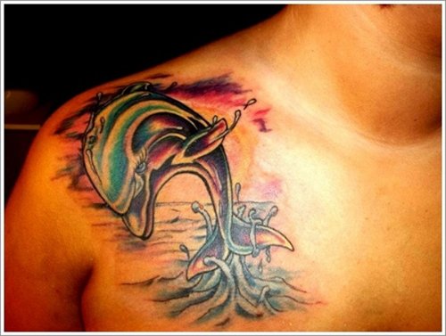 Colorful Jumping Dolphin Tattoo On Collar bone