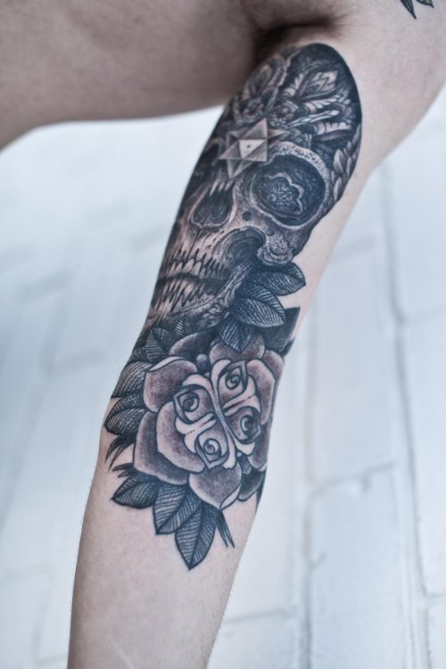 Awesome Skull and Flower Tattoo On Left Half Sleeve