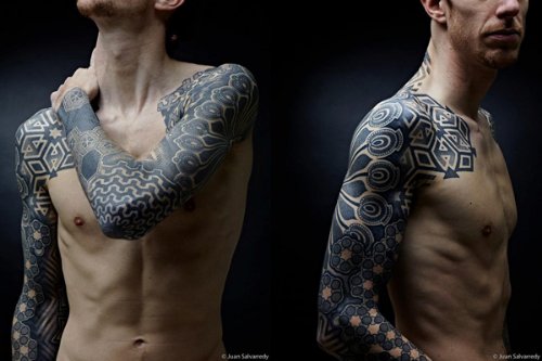 Black Ink Dotwork Tattoo On Man Right Sleeve