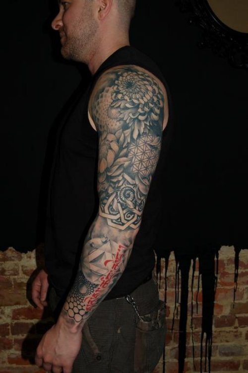 Geometric Dotwork Tattoo On Man Left Sleeve