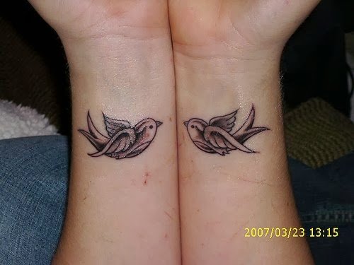 Grey Ink Dove Tattoos On Wrists