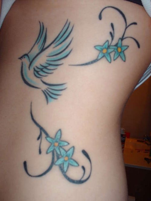 Blue Flowers Dove Tattoo On Left Side Rib