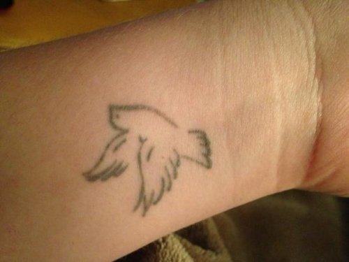 Cute Grey Ink Dove Tattoo On Wrist
