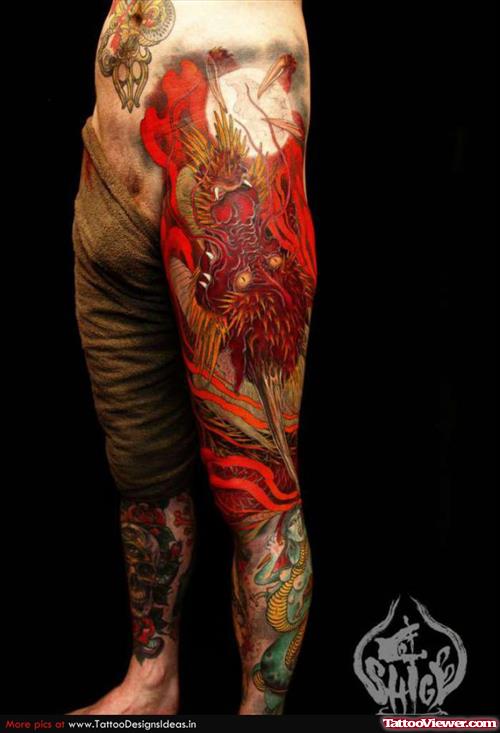Awesome colored Dragon Tattoo On Man Left Leg