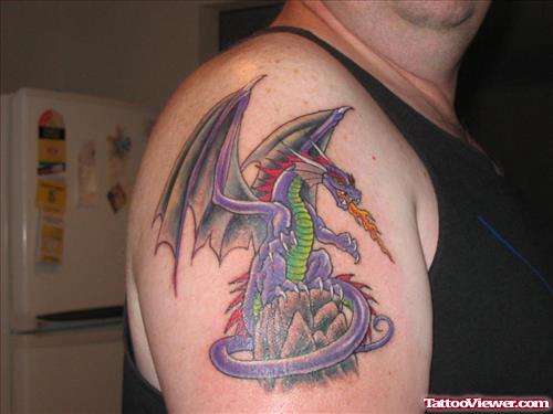 Beautiful Colored Dragon Tattoo On Man Right Shoulder