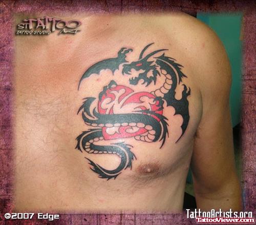 Black And Red Ink Dragon Tattoo On Man Chest