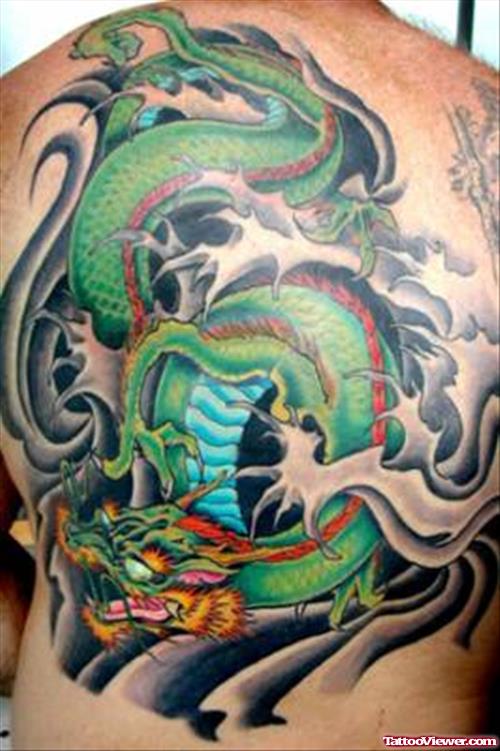 Colored Green Ink Dragon Tattoo On Back