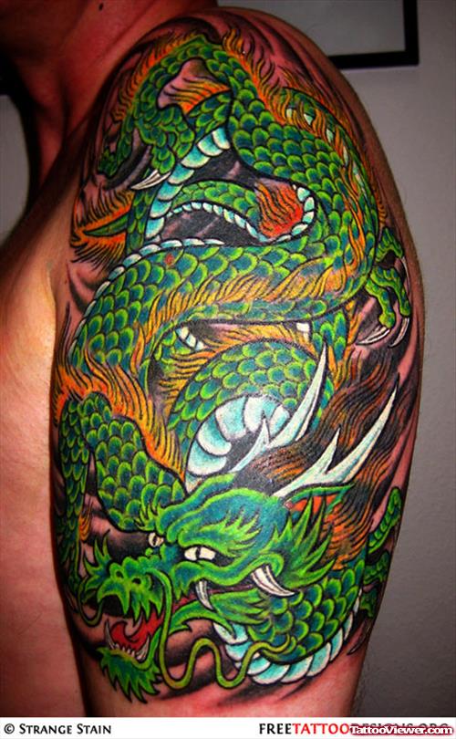 Green Dragon Tattoo On Man Left Half Sleeve