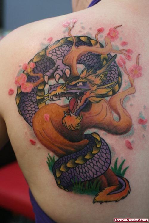Flowers Tree And Dragon Tattoo On Left Back Shoulder