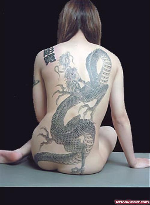 Best Grey Ink Dragon Tattoo On Girl Back Body