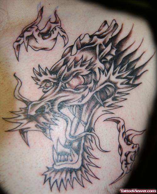 Awesome Grey Ink Dragon Head Tattoo