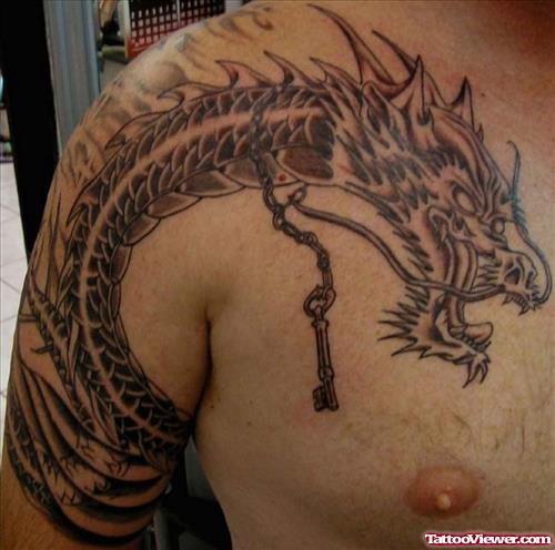 Impressive Grey Ink Dragon Tattoo On Man Chest