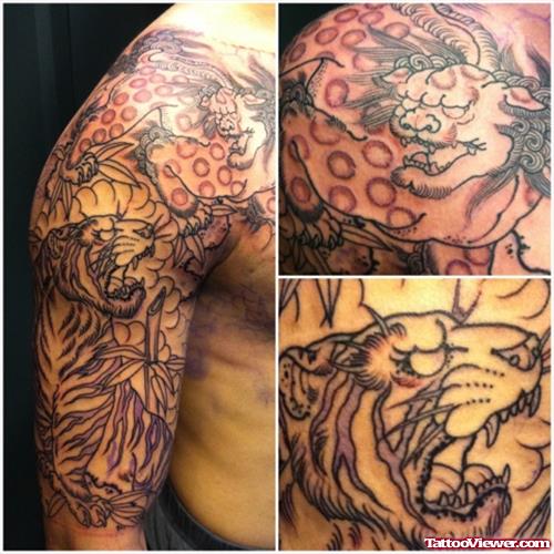 Grey Ink Dragon And Tiger Tattoo On Right Half Sleeve