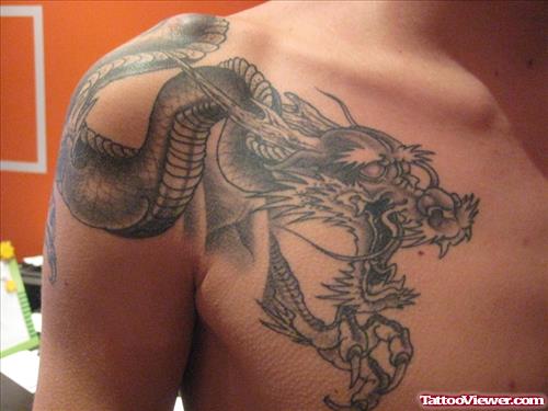 Best Grey Ink Dragon Tattoo On Man Chest