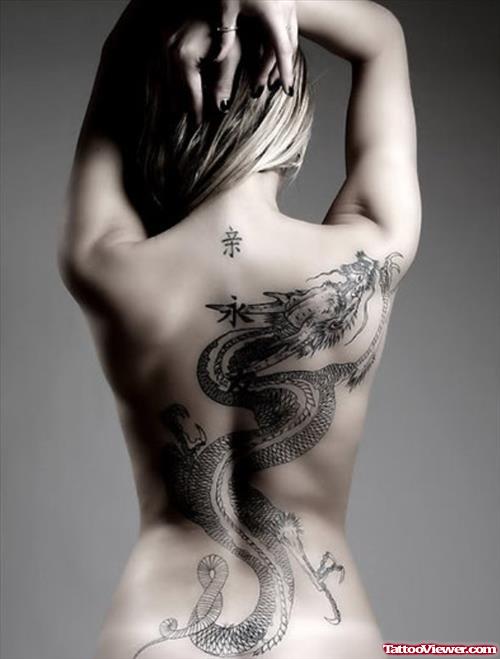 Grey Ink Chinese Dragon Tattoo On Girl Back Body