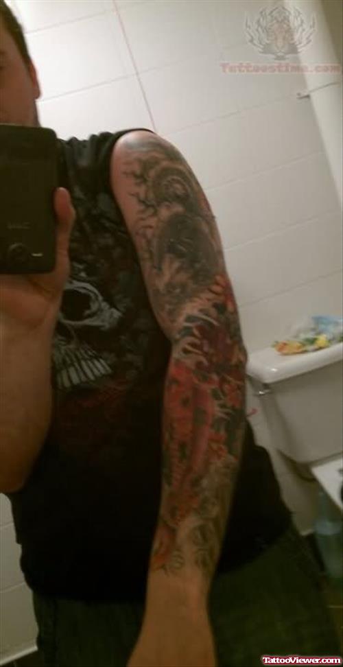 Dragon And Fish Tattoo On Arm