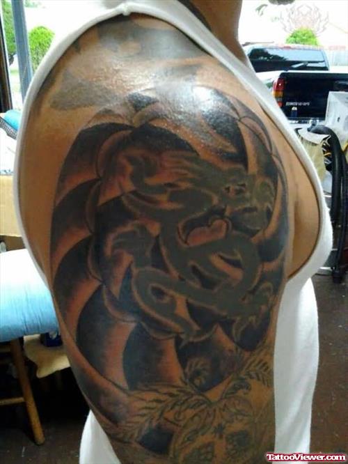 Black Ink Dragon Tattoo On Shoulder