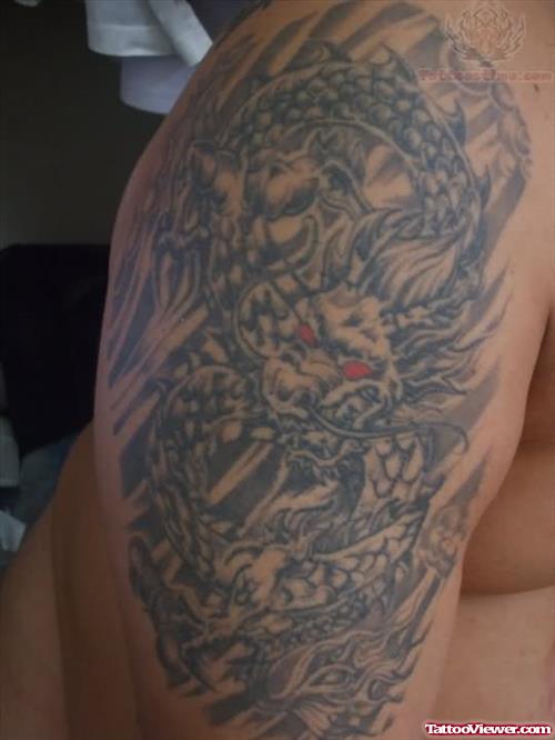 Red Eyed Dragon Tattoo On Biceps