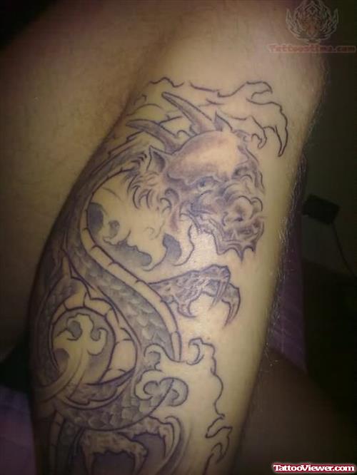 Dragon Grey Ink Tattoo On Leg