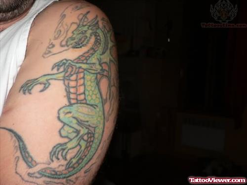 Green Ink Dragon Tattoo On Bicep