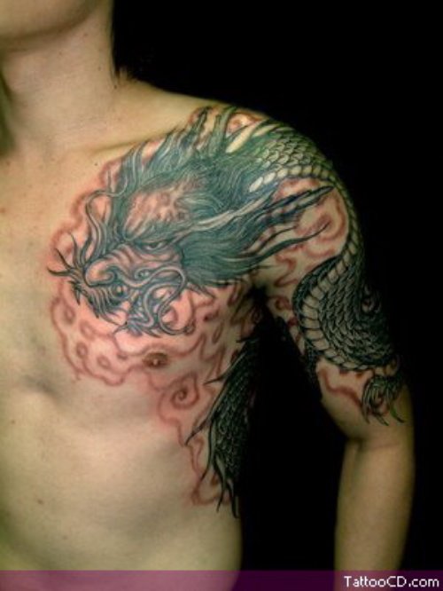 Grey Ink Dragon Tattoo On Man Left Chest And Shoulder