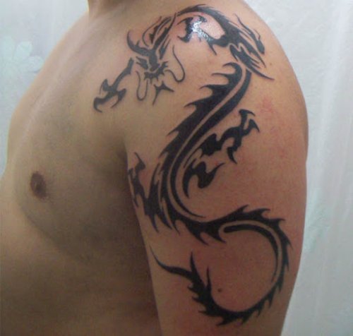 Tribal Black Dragon Tattoo On Left Shoulder