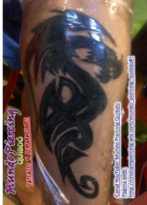 Black Ink Tribal Dragon Tattoo
