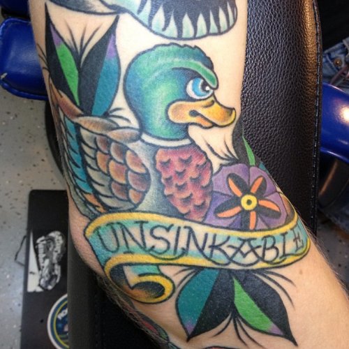 Unsinkable Banner And Duck Color Ink Tattoo