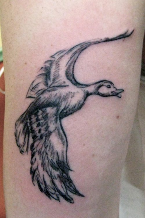 Grey Ink Flying Duck Tattoo For Young Girls