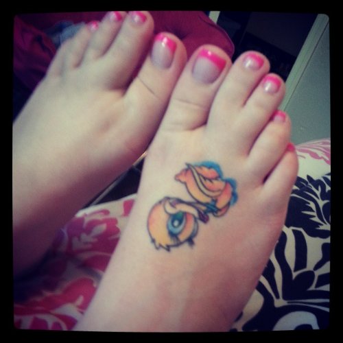 Color Ink Duck Tattoo On Right Foot
