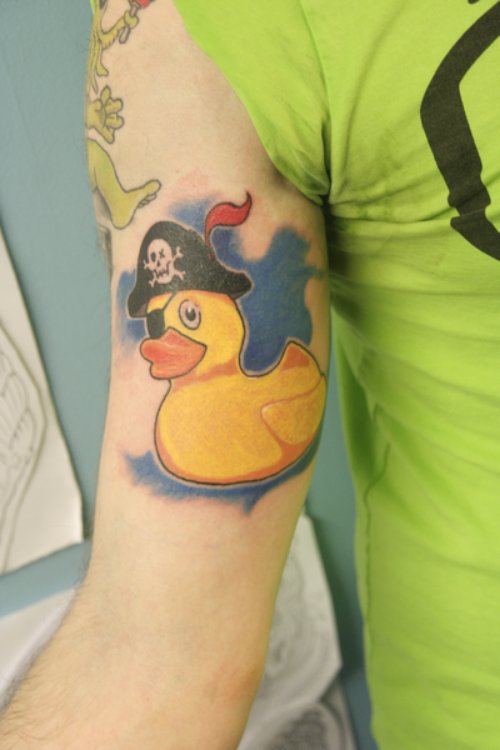 Rubber Duck With Pirate Hat Tattoo On Right Bicep