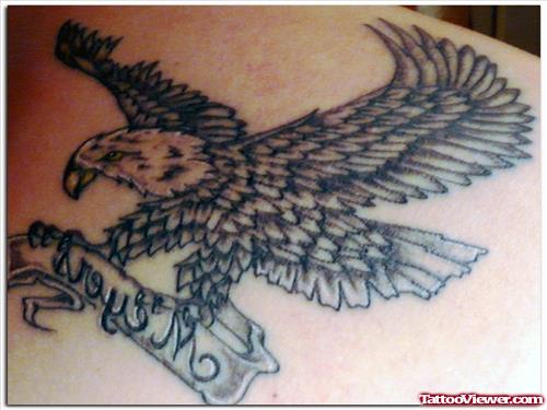 Grey Ink Eagle With Banner Tattoo