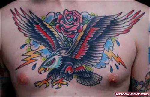 Red Rose And Eagle Tattoo On Man Chest