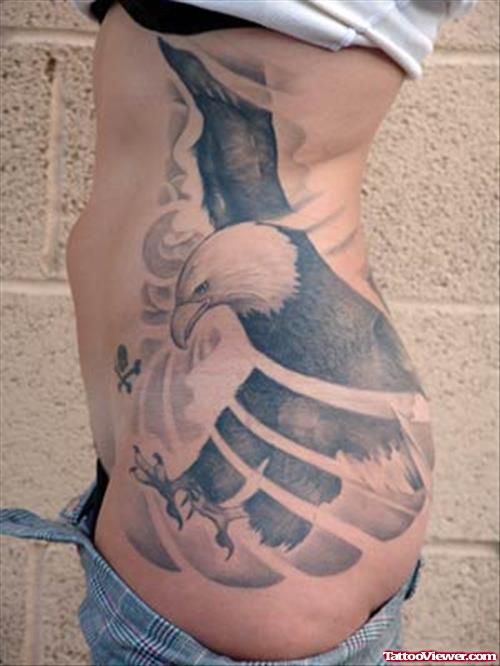 Grey Ink Eagle Tattoo On Left Side Rib