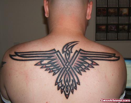 Good Tribal Eagle Tattoo On Man Upperback