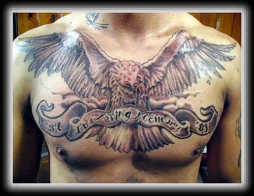 Awesome Flying Eagle With Banner Tattoo On Chest