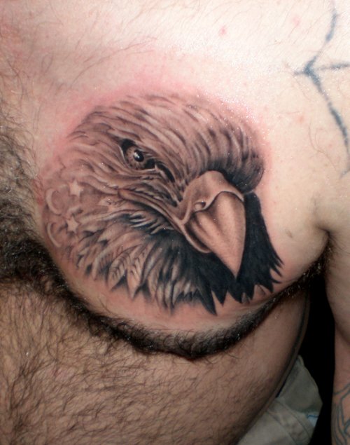 Eagle Head Tattoo On Man Chest