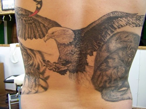 Flying Bald Eagle Tattoo On Lowerback